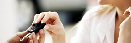 woman receiving car key from man
